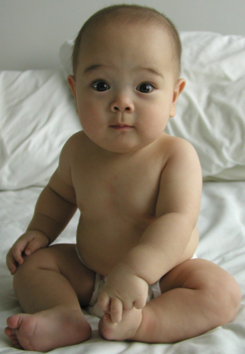 p1260399 Kyle half naked on bed