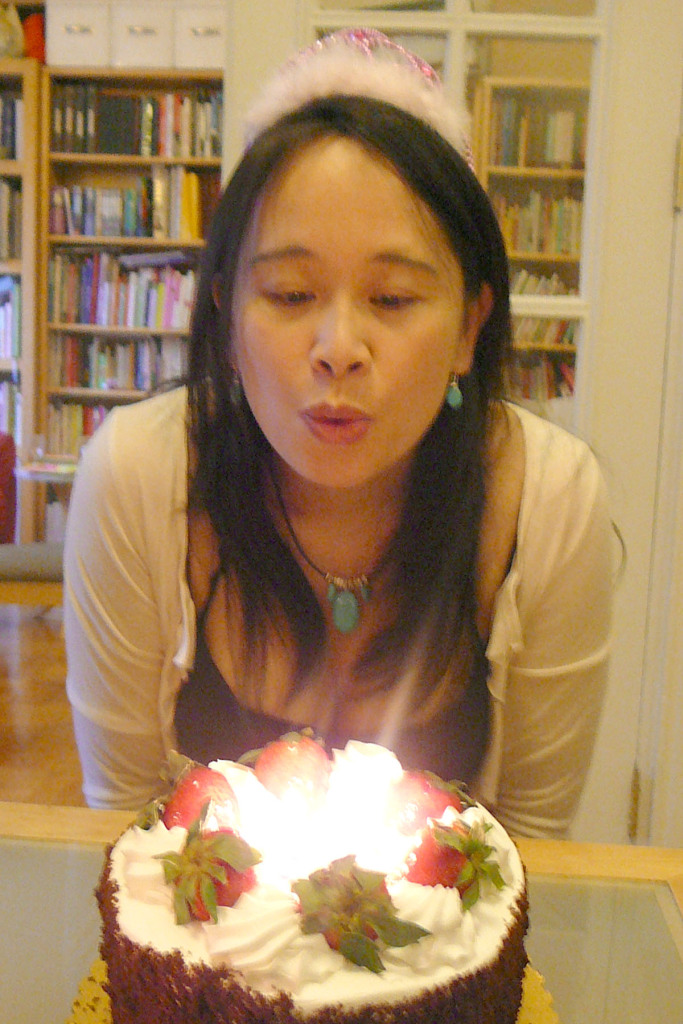 Nina Blowing Cake