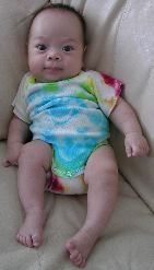 p9116288 Kyle in tiedye on couch