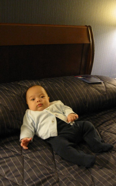 pa103236 Kyle in a Huge Hotel Bed