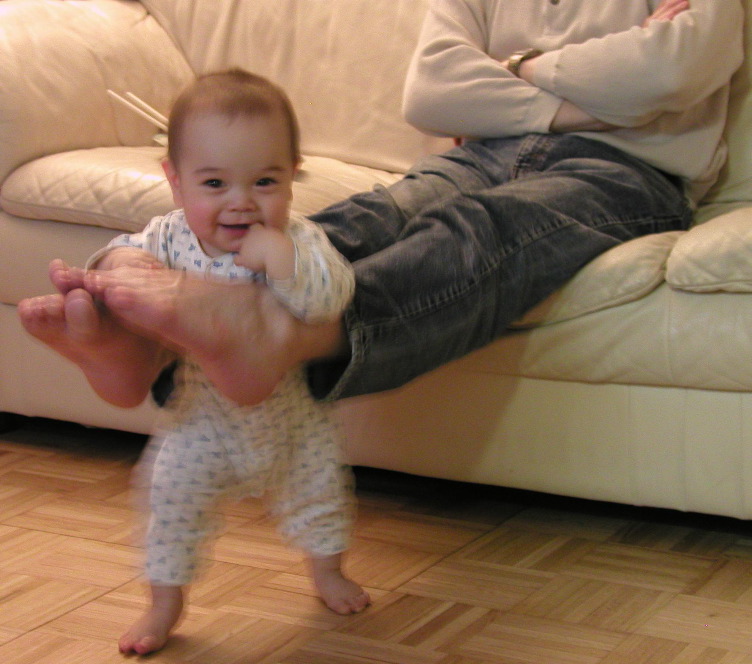 20040407-0913 Kyle standing in daddys feet