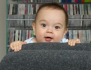 20040425-1047 Kyle peeking over chair back