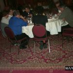 Eric Siegelfacing camera between faculty in blue and black shirt p0000040
