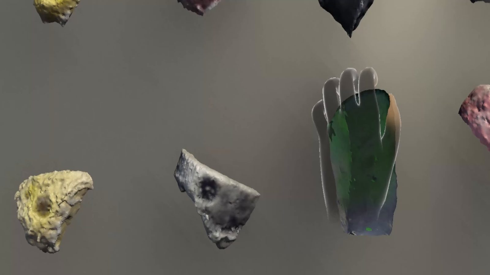 Still from the video: a translucent hand on a green hold among scanned holds. Opens on YouTube.